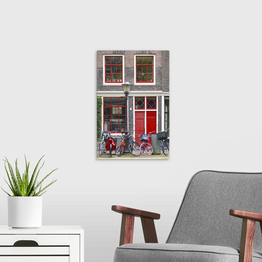 A modern room featuring House and bicycles on Bloemgracht canal, Amsterdam, Netherlands