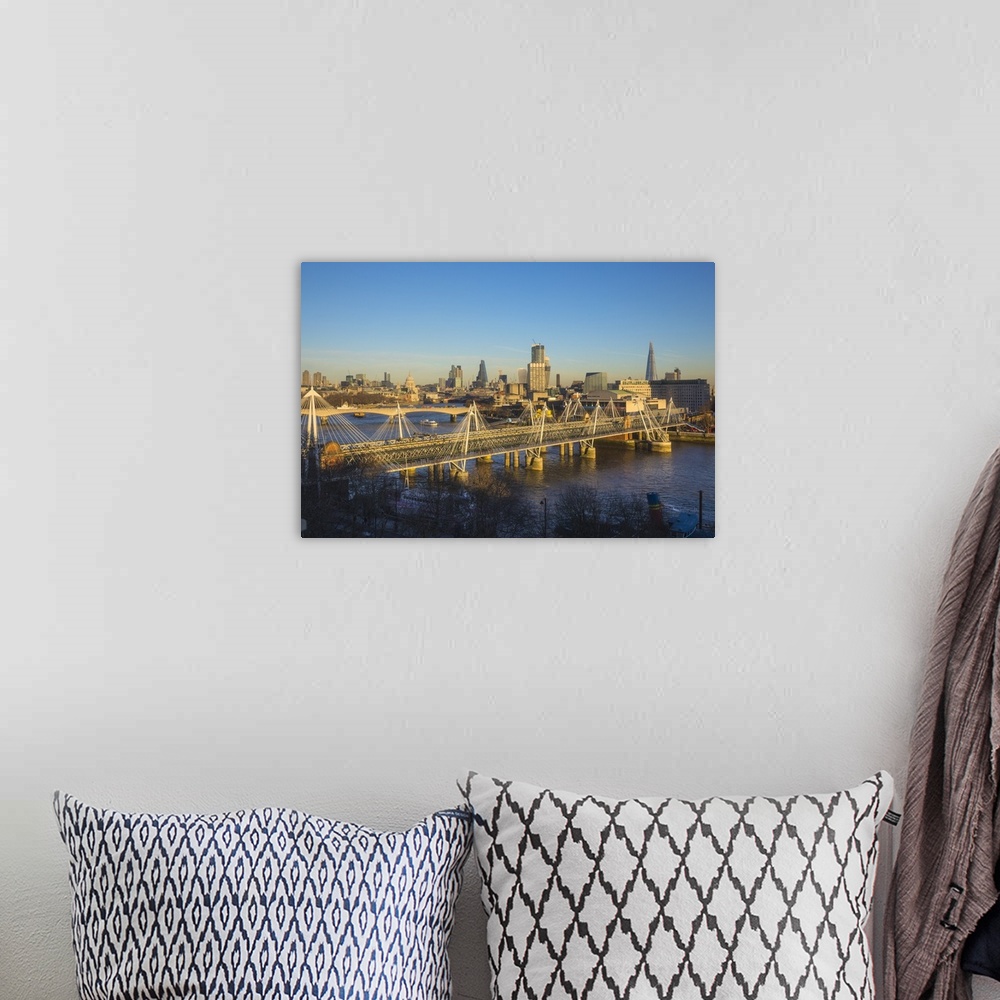 A bohemian room featuring Hungerford Bridge and Golden Jubilee Bridges, River Thames, London, England, UK.