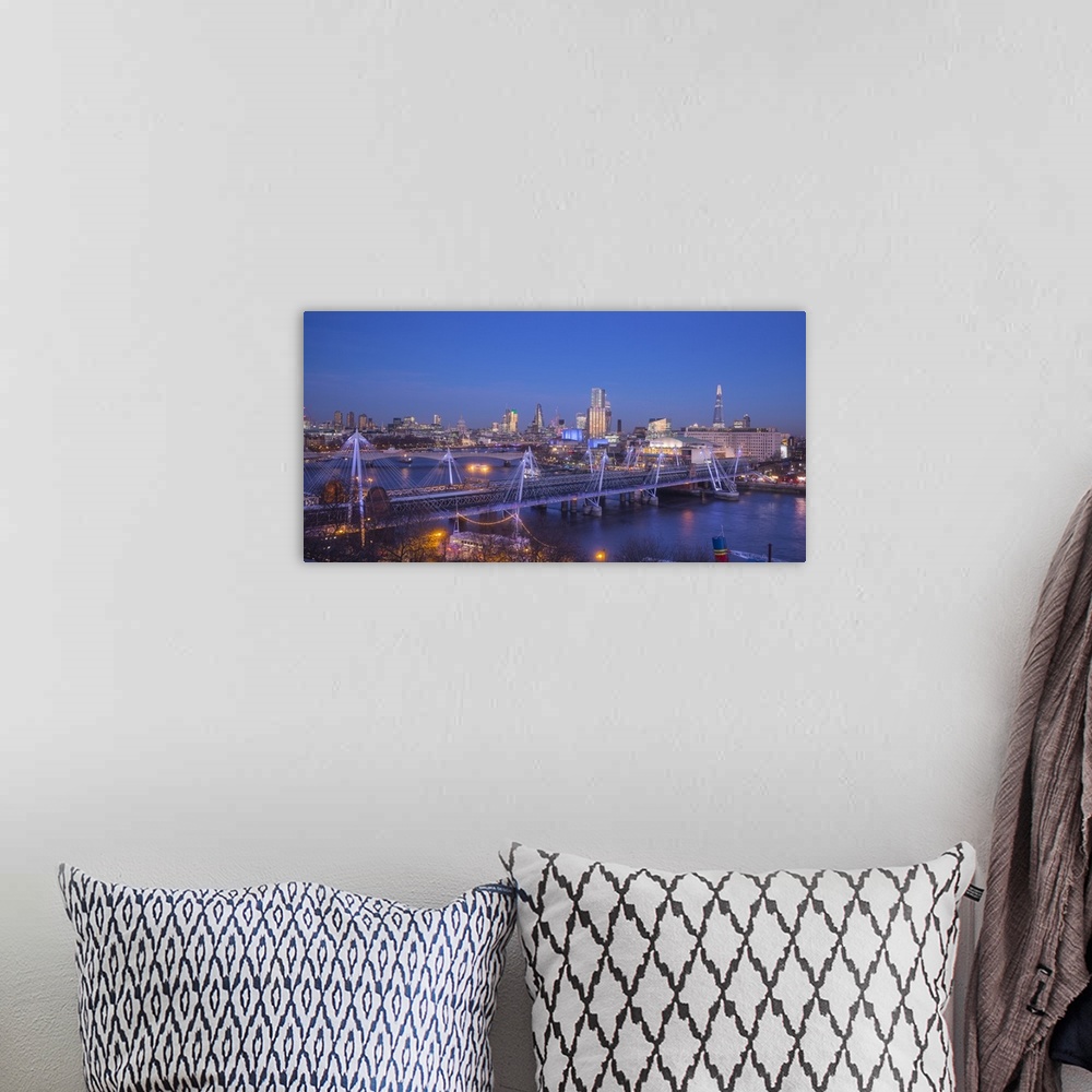 A bohemian room featuring Hungerford Bridge and Golden Jubilee Bridges, River Thames, London, England, UK.