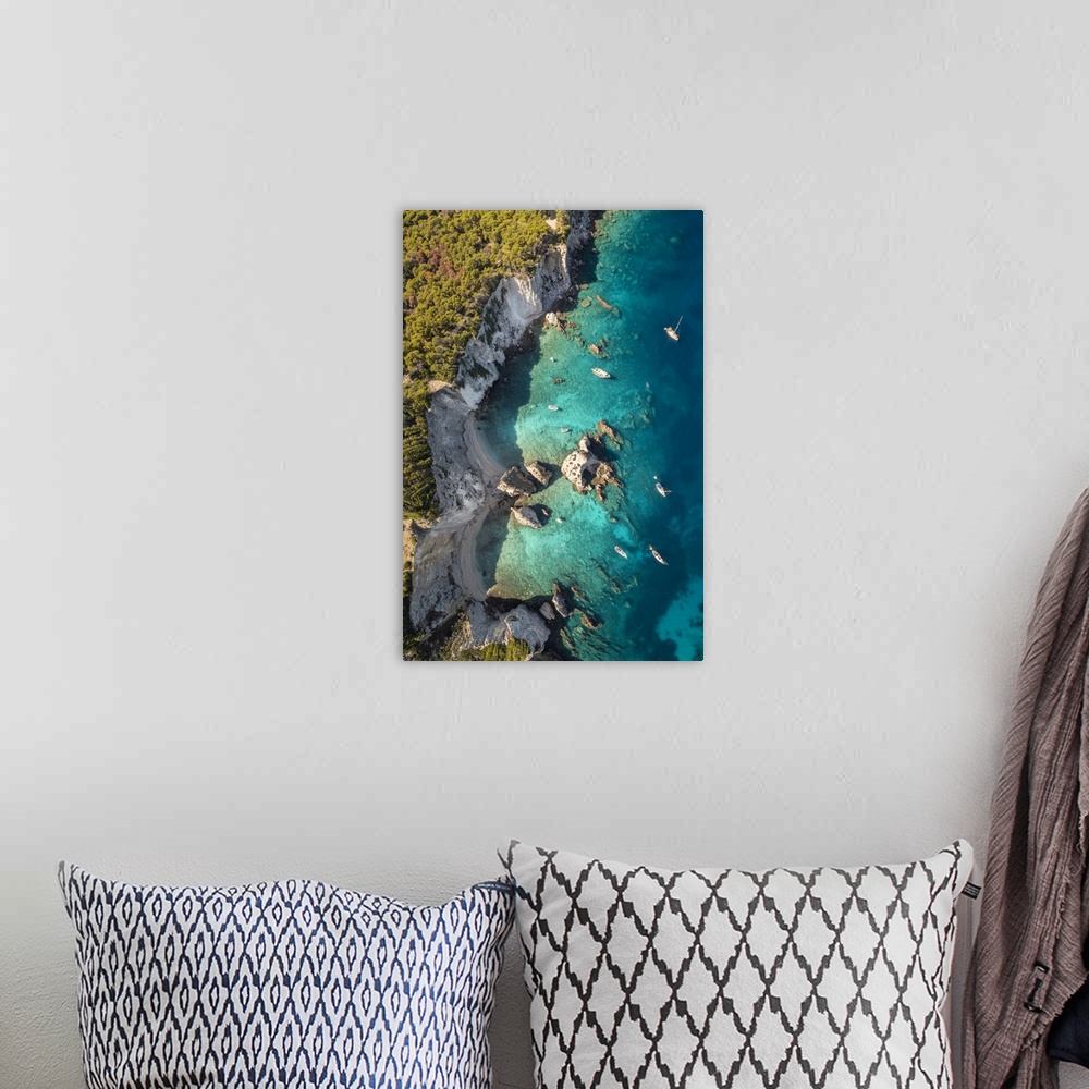 A bohemian room featuring I Pagliai beach and cove on Isola san Domino. Tremiti Islands, Foggia district, Puglia, Italy