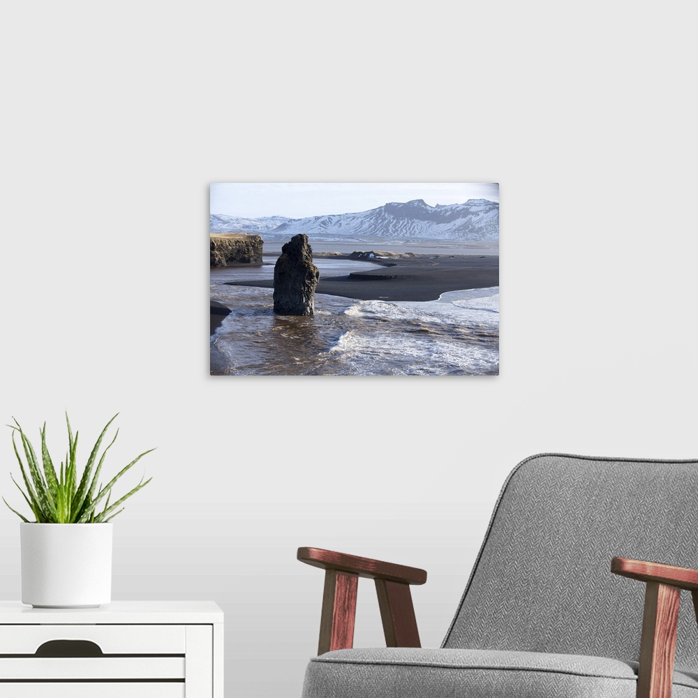 A modern room featuring Iceland, Dryholaey. Waves breaking on Reynisfjara beach at Dryholaey.