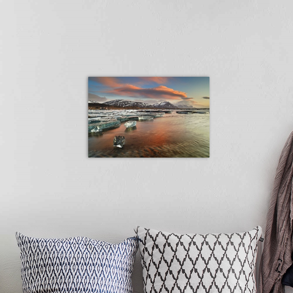 A bohemian room featuring Iceland, South Iceland, Jokulsarlon, Ice on the lagoon reflecting the colours of dawn