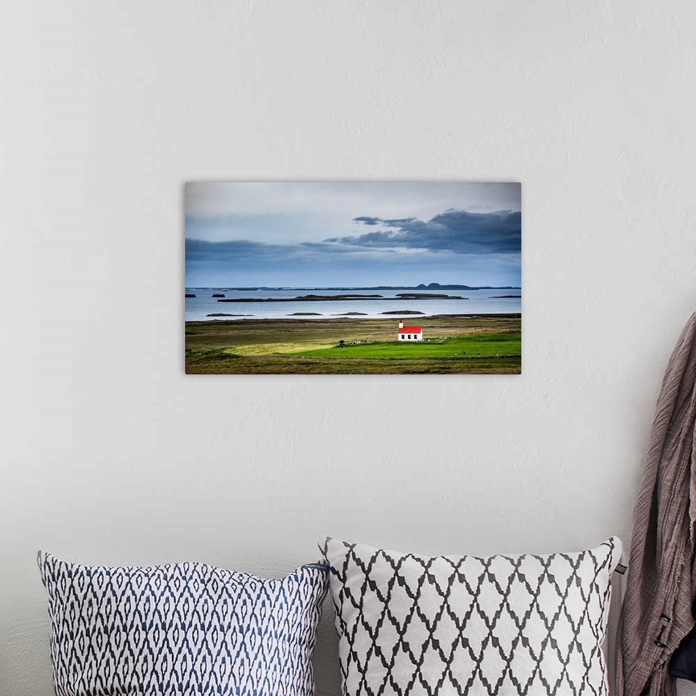 A bohemian room featuring Iceland, Westfiords and lonely church in the green landscape
