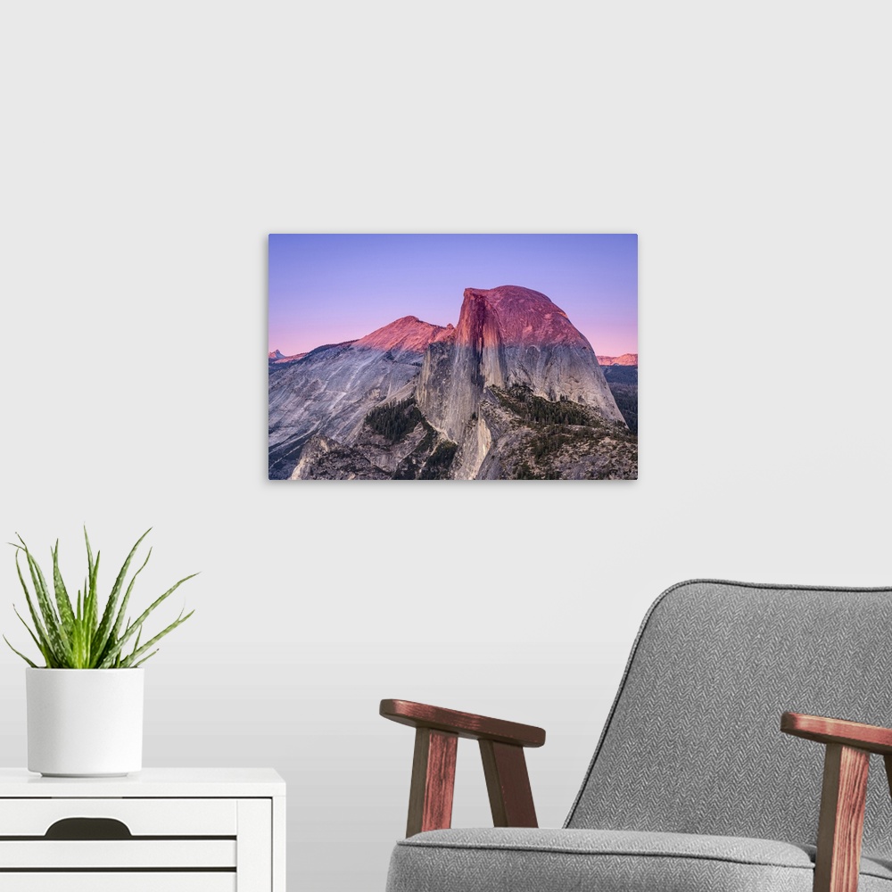 A modern room featuring Idyllic view of Half Dome granite rock formation at Yosemite National Park during sunset, Sierra ...