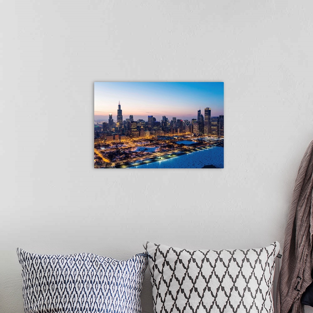 A bohemian room featuring USA, Illinois, Chicago. Aerial dusk view of the city and Millennium Park in winter.