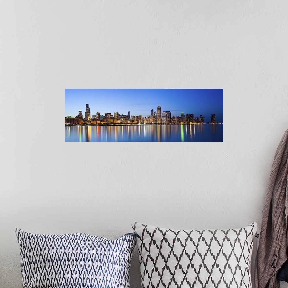 A bohemian room featuring USA, Illinois, Chicago. Dusk view of the skyline from Lake Michigan.