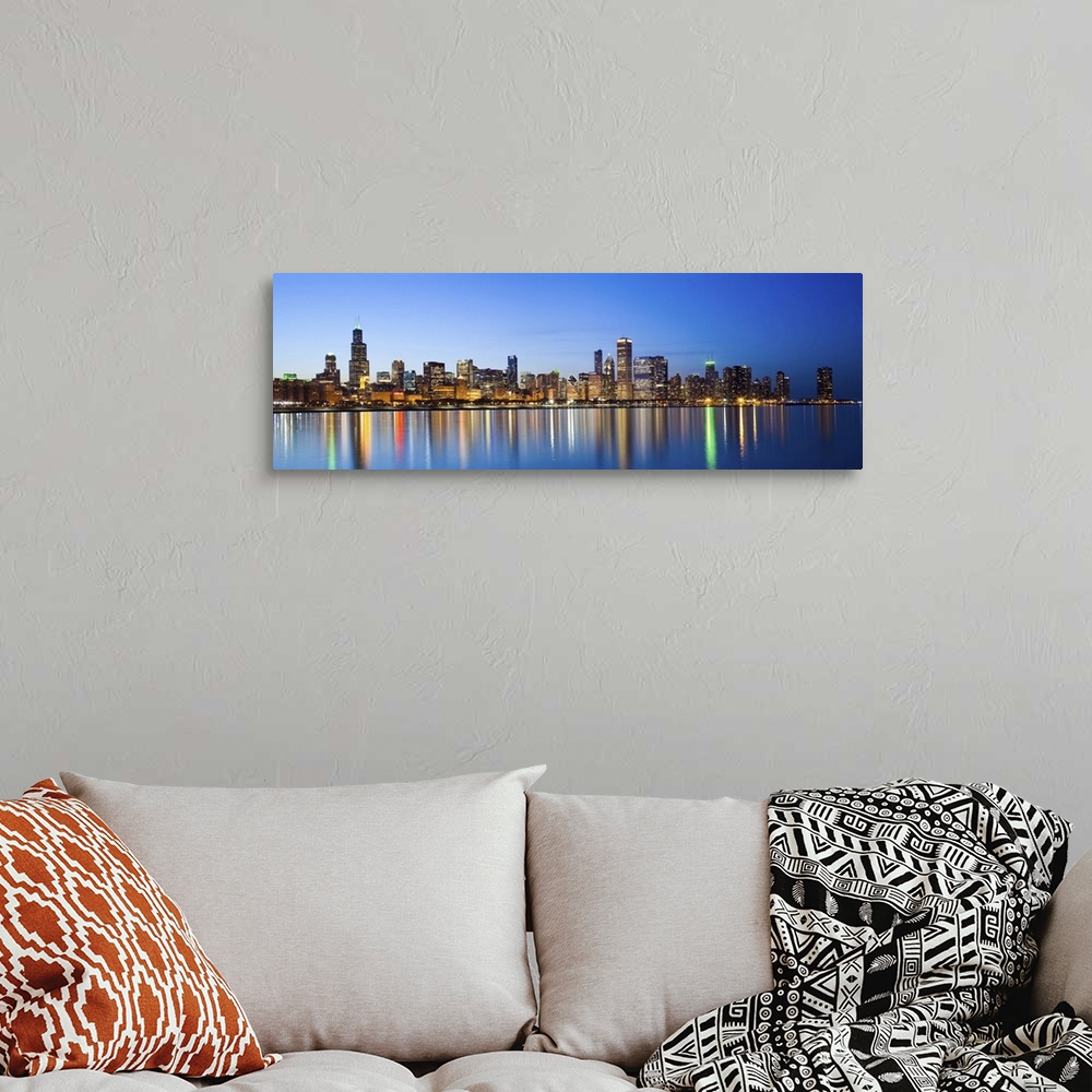 A bohemian room featuring USA, Illinois, Chicago. Dusk view of the skyline from Lake Michigan.