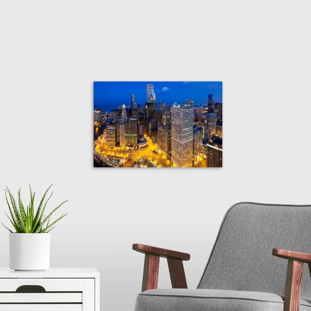 A modern room featuring USA, Illinois, Chicago. Dusk view over the city.