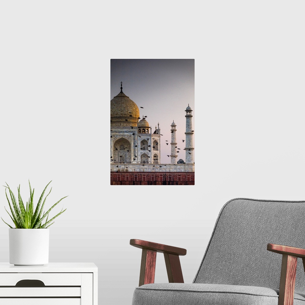 A modern room featuring India, Birds Flock In Front The Taj Mahal Dome At Sunset