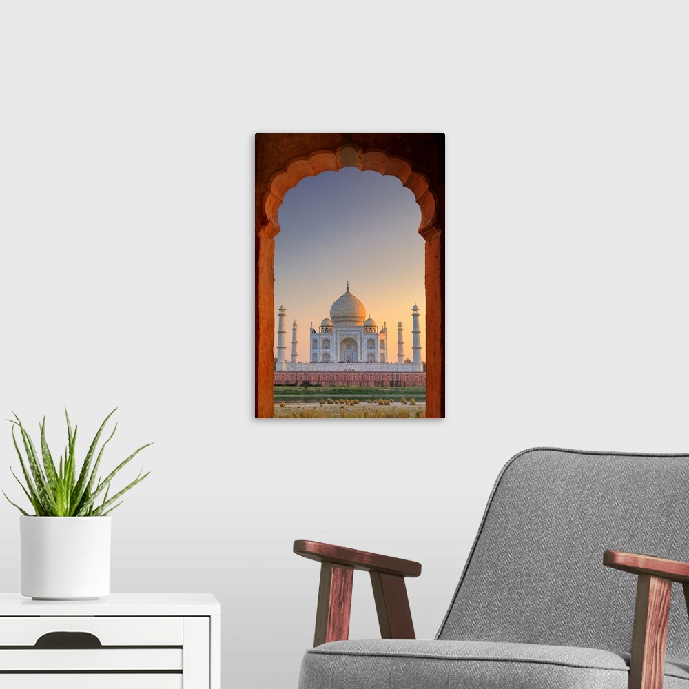 A modern room featuring India, Taj Mahal At Sunset Framed By A Temple Arch
