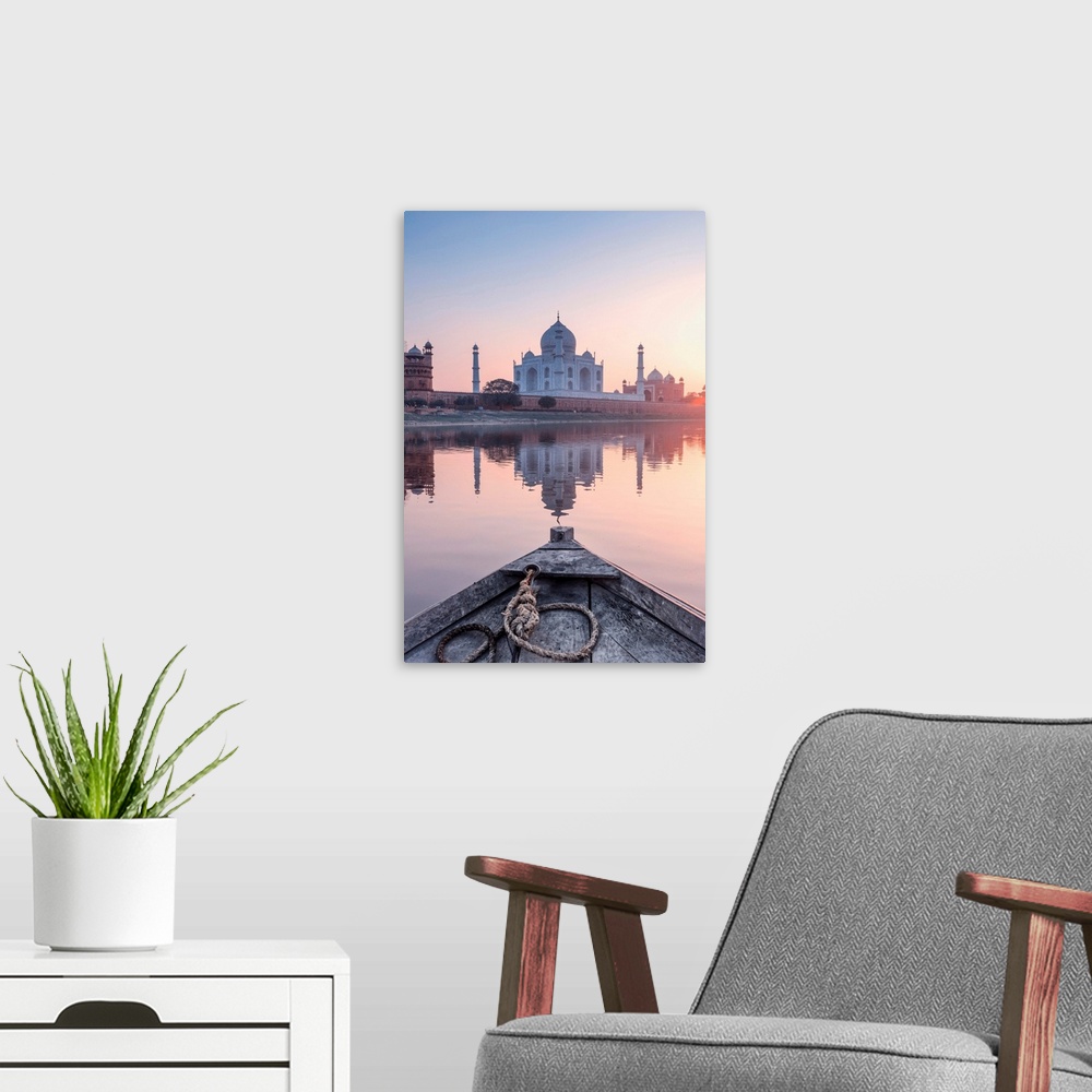 A modern room featuring India, View Of The Taj Mahal Reflecting In The Yamuna River At Sunset From A Wooden Boat