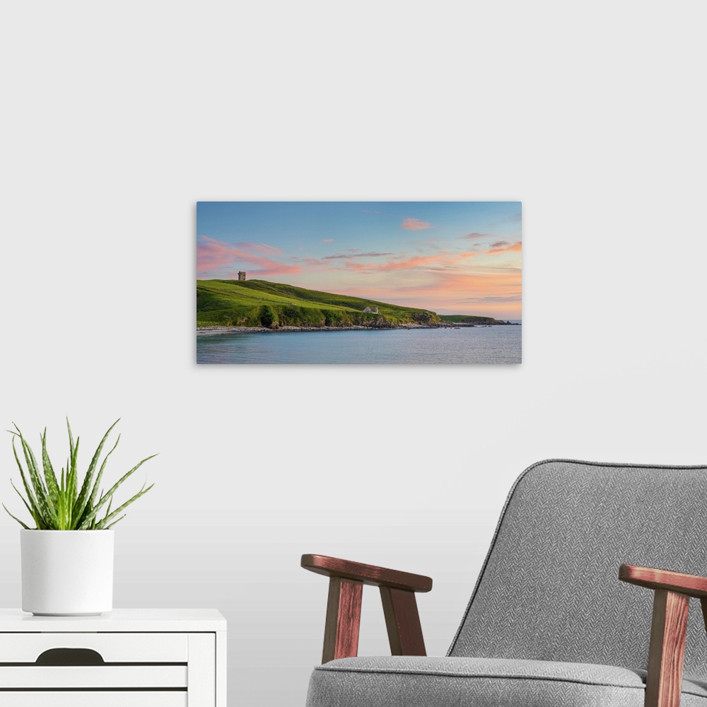A modern room featuring Ireland, Co.Donegal, Crohy head, Maghery bay and Signal station at dusk