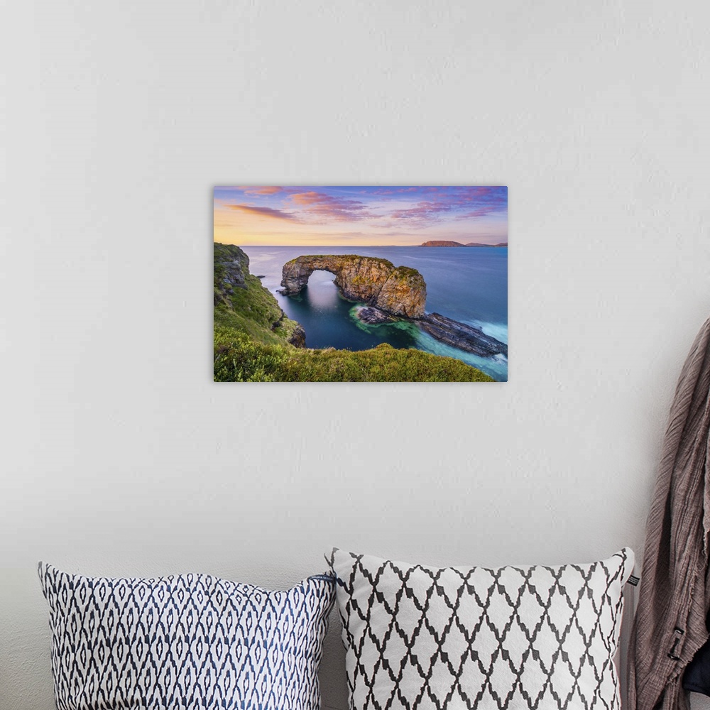 A bohemian room featuring Ireland, Co.Donegal, Fanad, Great Pollet sea arch at dusk