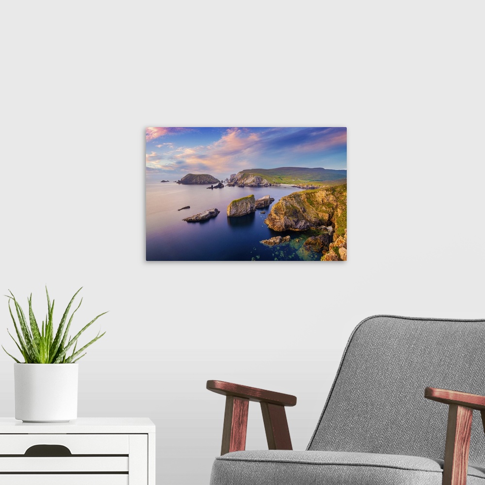 A modern room featuring Ireland, Co.Donegal, Port (An Port), Rocky coastline at dusk.
