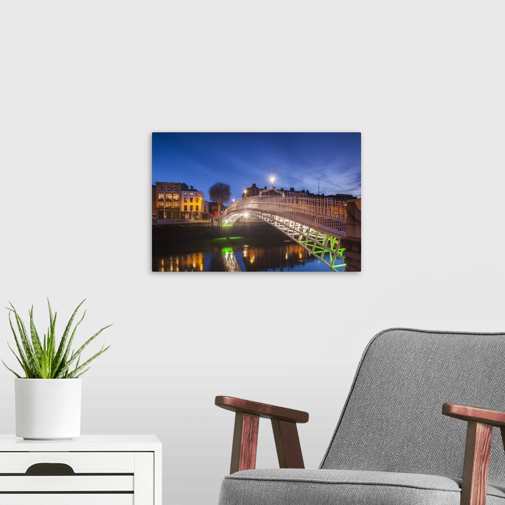 A modern room featuring Ireland, Dublin, Hapenny Bridge over the River Liffey, dawn.