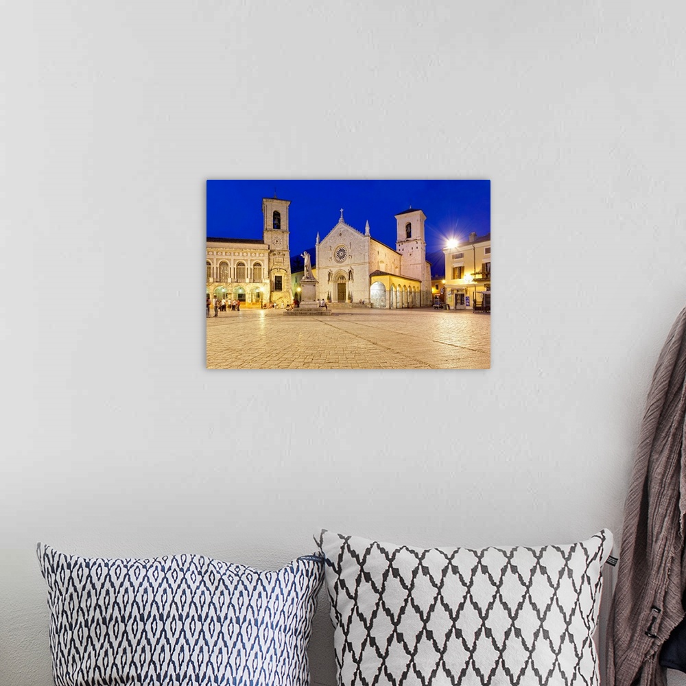 A bohemian room featuring Italy, Umbria, Perugia district, Monti Sibillini National Park, Norcia, Piazza San Benedetto