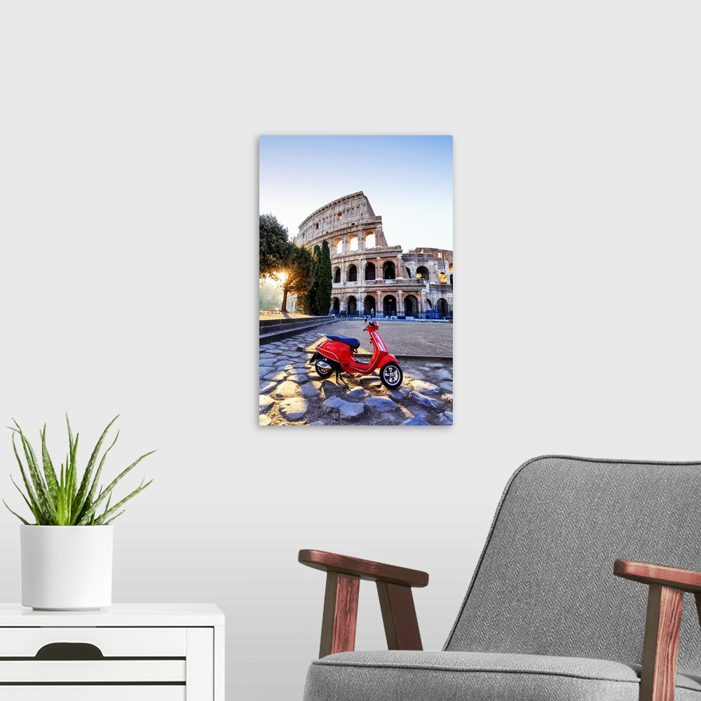 A modern room featuring Italy, Rome, a red Vespa motorbike in front of Colosseum at sunrise