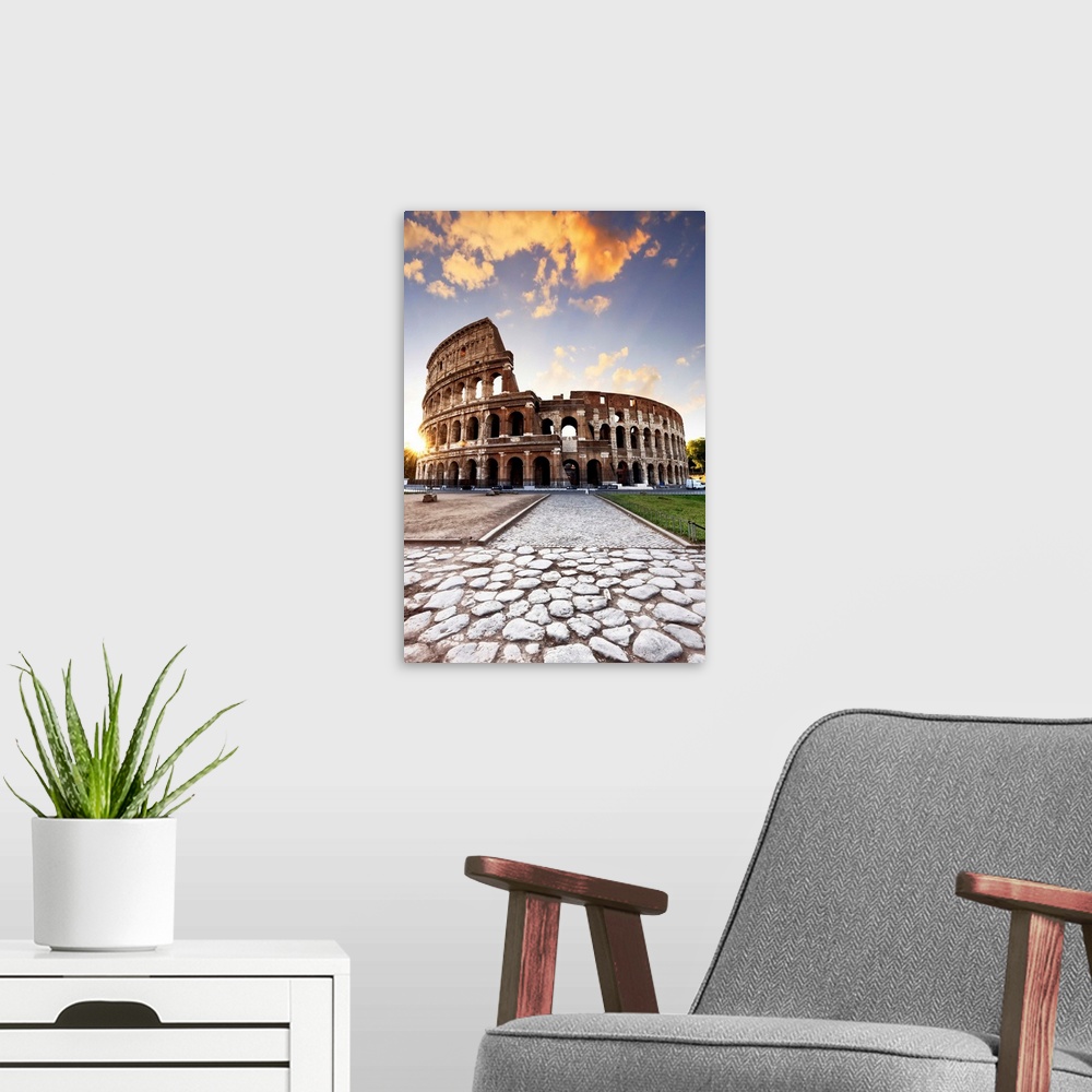 A modern room featuring Italy, Rome, Colosseum and Roman Forum at sunrise