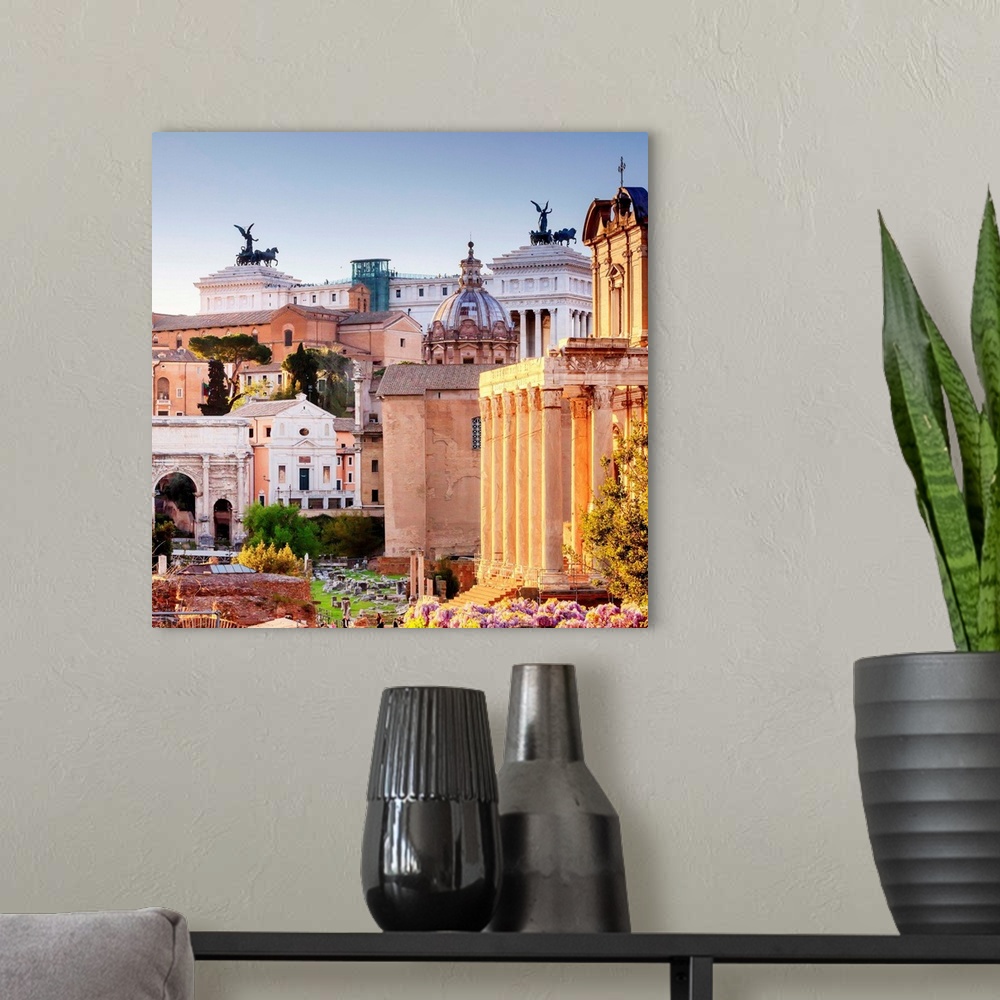 A modern room featuring Italy, Rome, Roman Forum and Altare della Patria monument at sunset