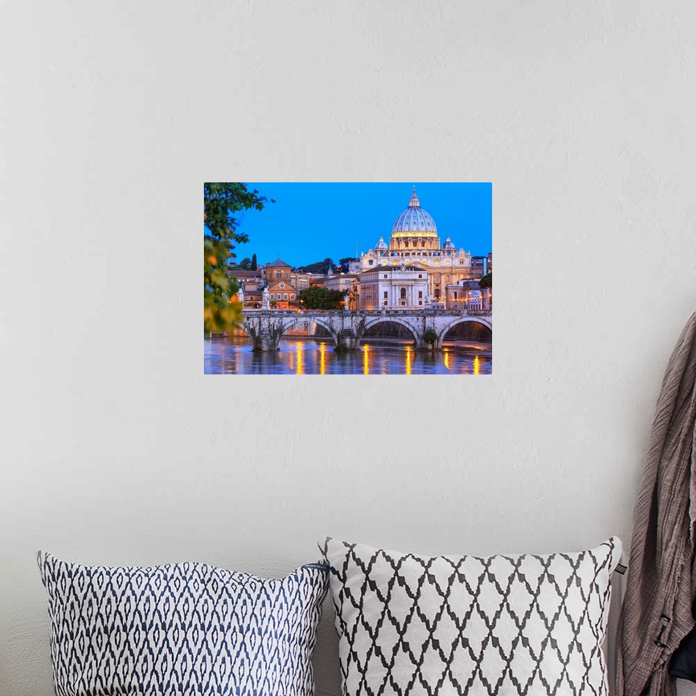 A bohemian room featuring Italy, Rome, St. Peter Basilica by night reflecting on Tevere river