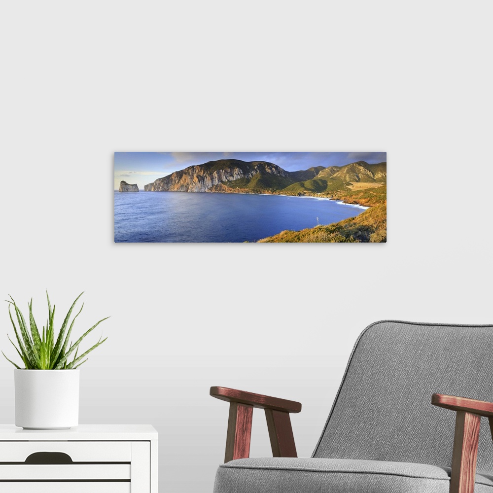A modern room featuring Italy, Sardinia, Masua, and in the background the Pan di Zuchero