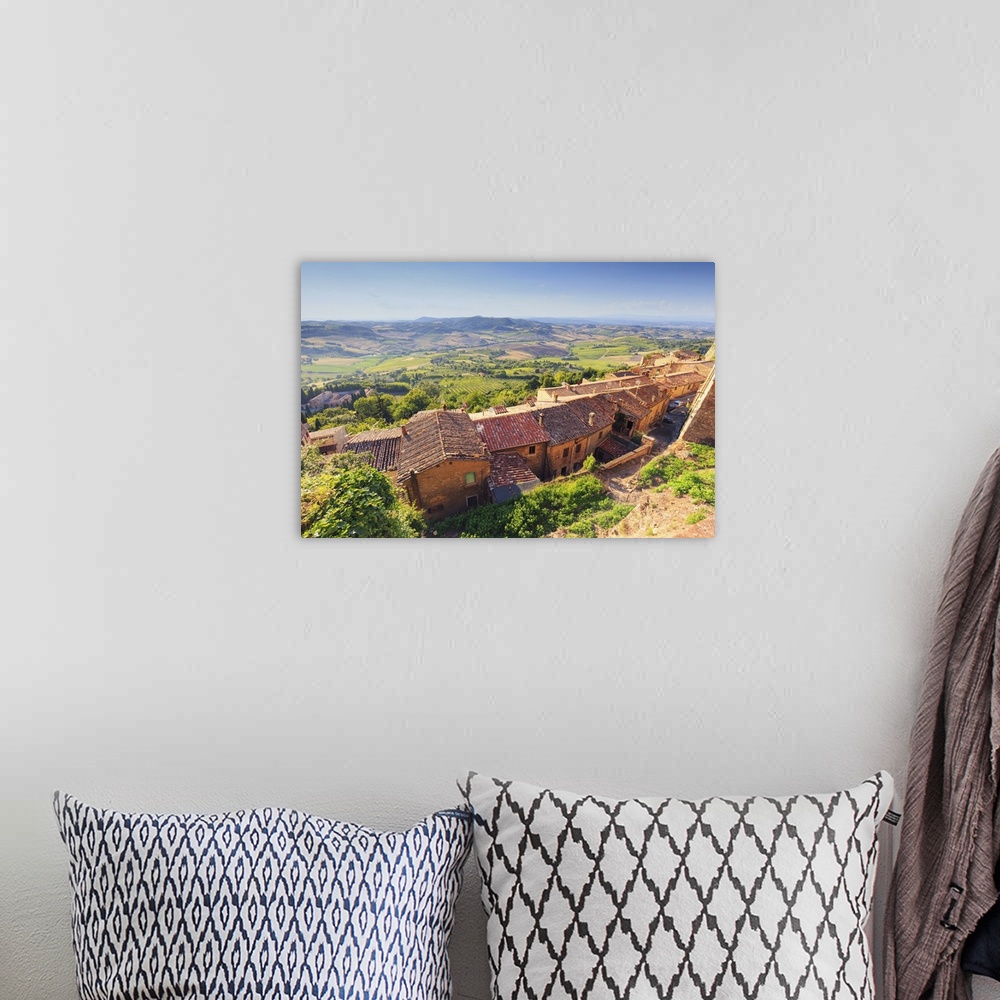 A bohemian room featuring Italy, Tuscany, Siena district, Val di Chiana, Montepulciano, view from ramparts.