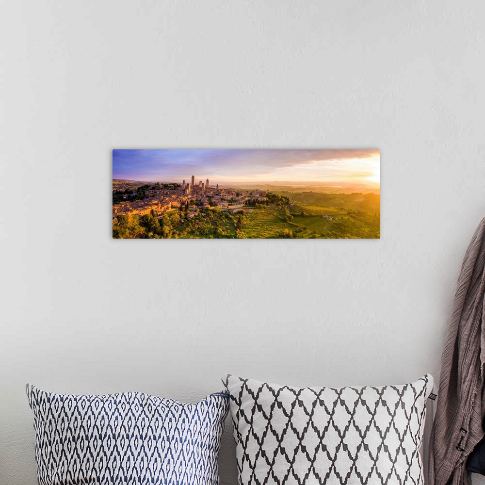 A bohemian room featuring Italy, Tuscany, Val d'Elsa. Panoramic aerial view of the medieval village of San Gimignano, a UNE...