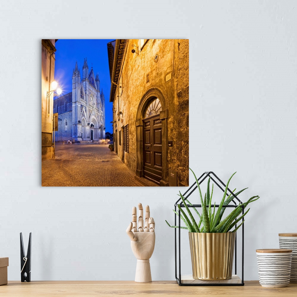A bohemian room featuring Italy, Umbria, Terni district, Orvieto,  Cathedral in Piazza Duomo.
