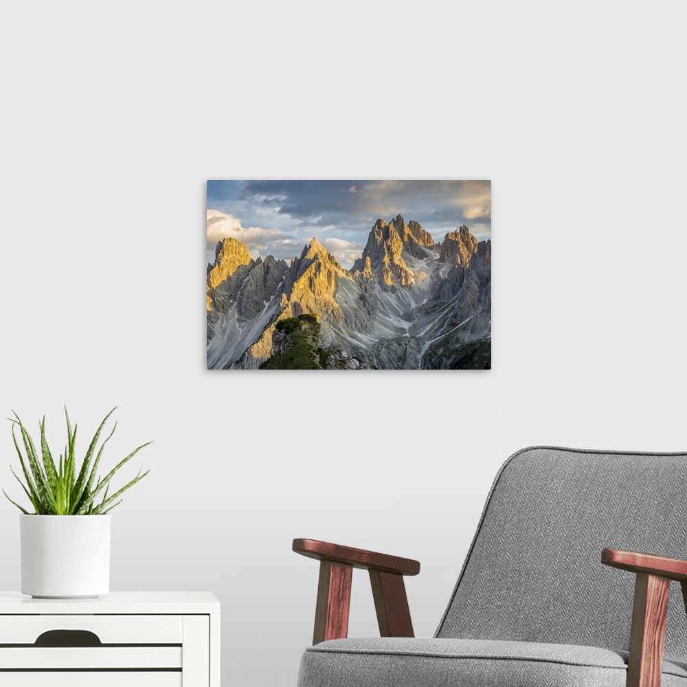 A modern room featuring Italy,Veneto,Belluno district,Auronzo di Cadore,sunset over the many spiers that shape the Cadini...