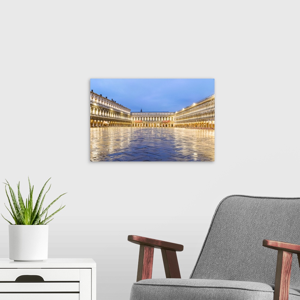 A modern room featuring Italy, Veneto, Venice. St Marks square illuminated before dawn