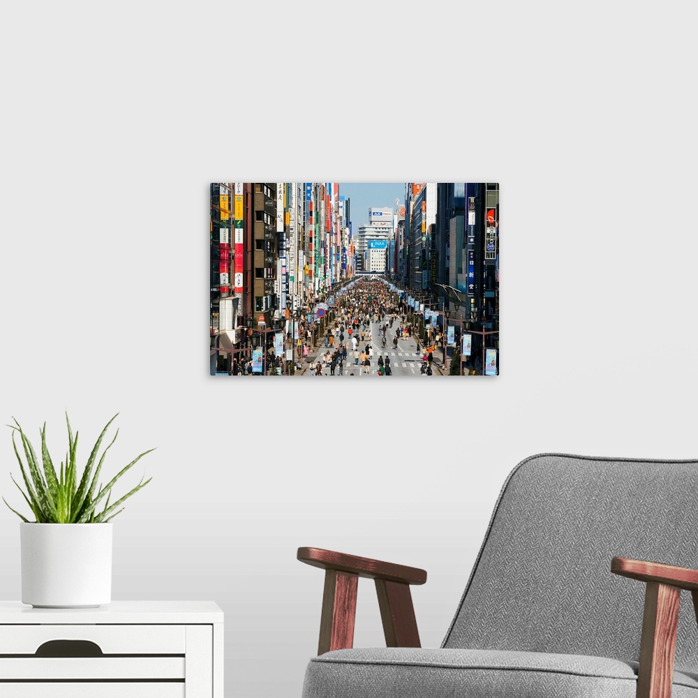 A modern room featuring Asia, Japan, Honshu, Tokyo, Ginza, elevated view along Chuo-dori, the most fashionable shopping s...