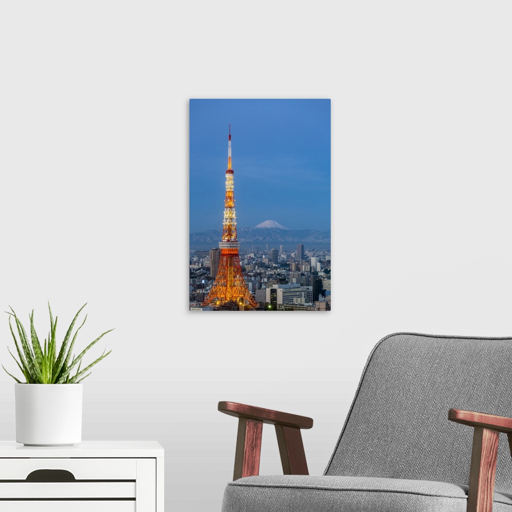 A modern room featuring Japan, Tokyo, elevated night view of the city skyline and iconic illuminated Tokyo Tower