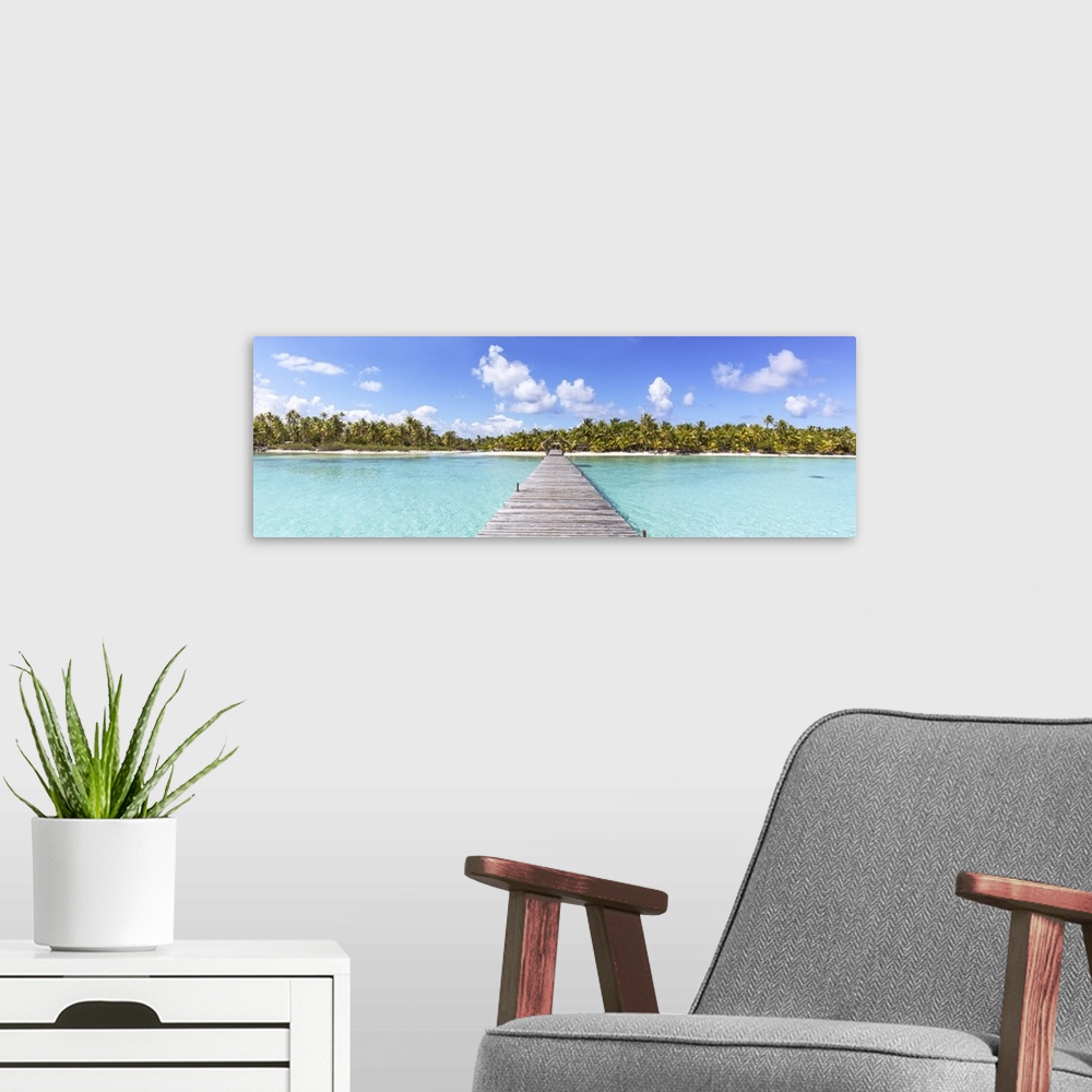 A modern room featuring Jetty to tropical island, Tikehau atoll, Tuamotus, French Polynesia.