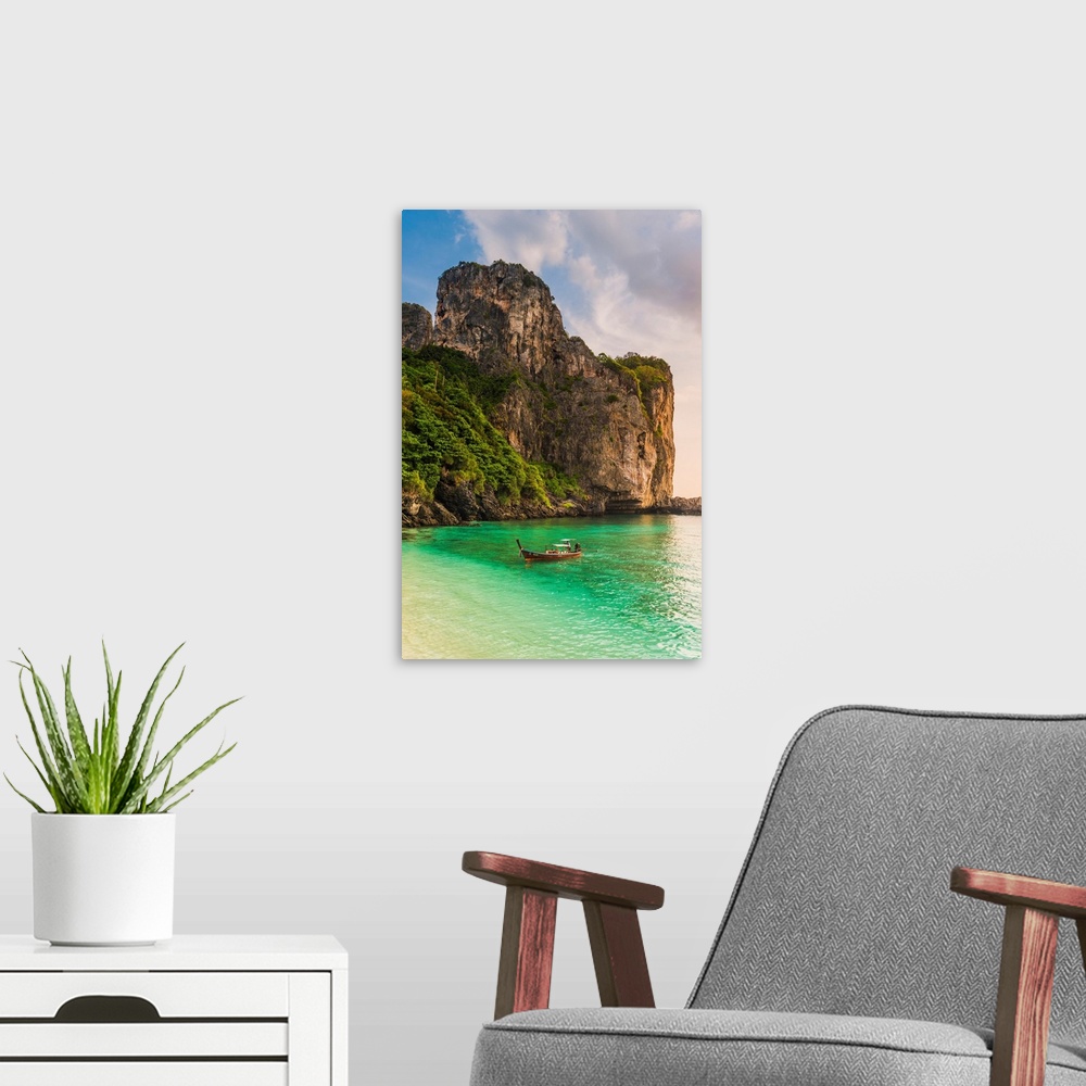 A modern room featuring Ao Nui (Nui Beach), Ko Phi Phi Don, Krabi Province, Thailand. Karst Rock Formations At Sunset.