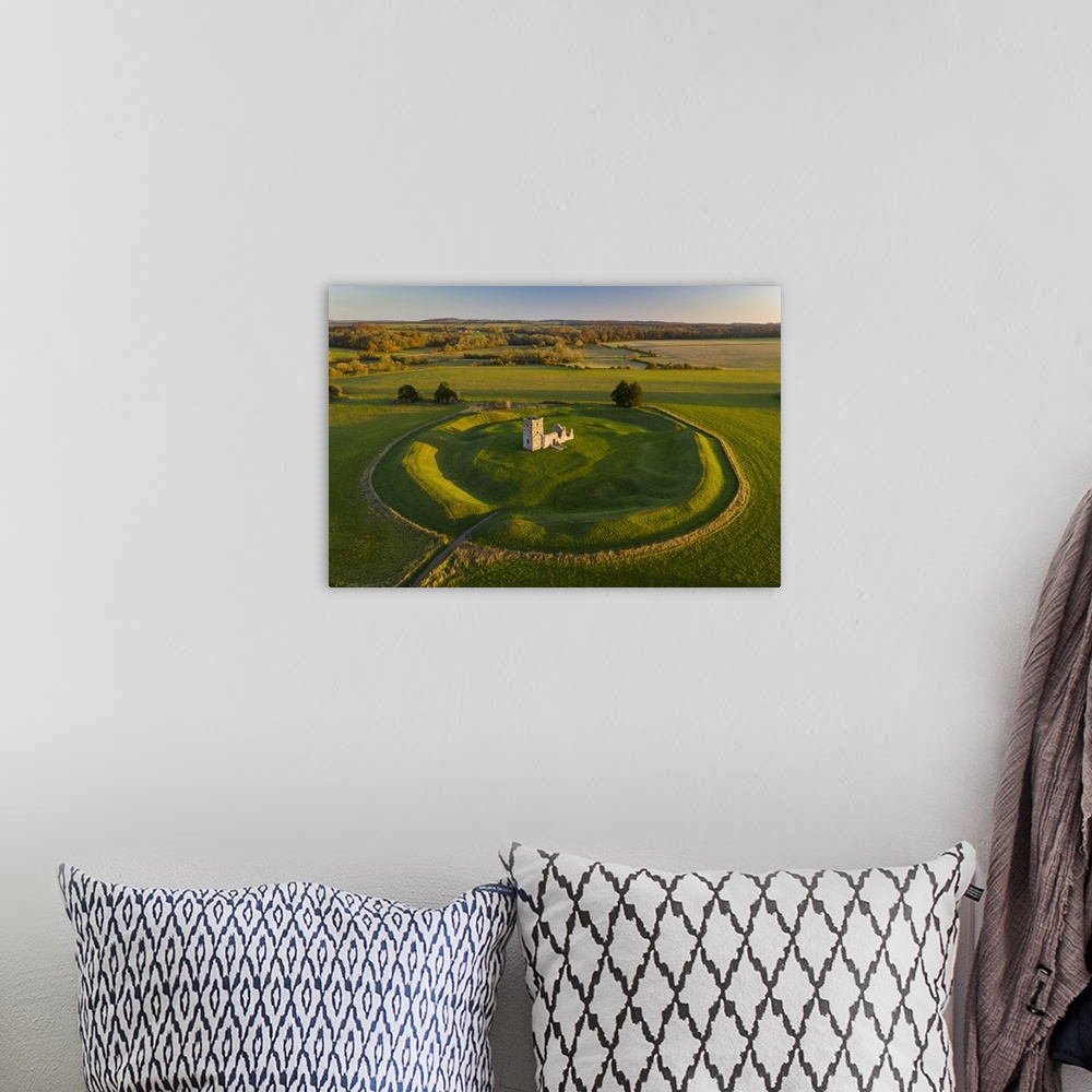 A bohemian room featuring Aerial view of Knowlton Church and neolithic Church Henge, Dorset, England. Autumn, November 2021.