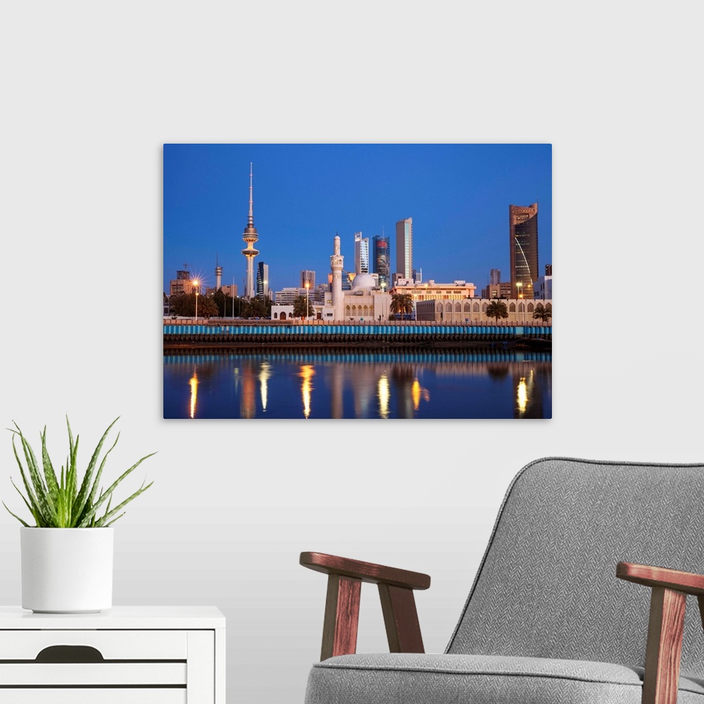 A modern room featuring Kuwait, Kuwait City, City skyline reflecting in  harbour