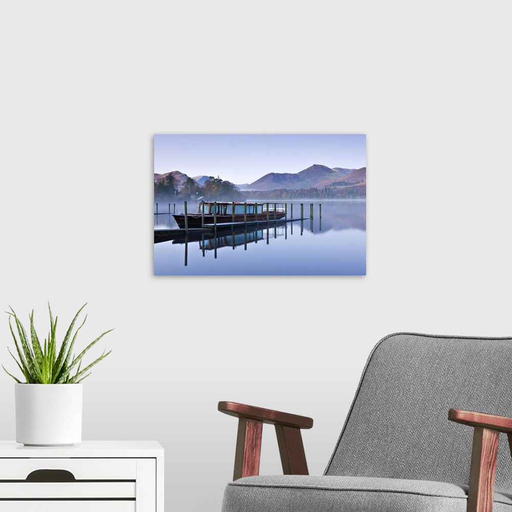 A modern room featuring Lakeland Mist pleasure boat moored on a placid Derwent Water on a misty and frosty morning, Keswi...