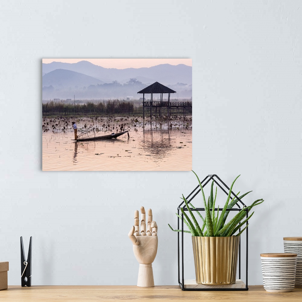 A bohemian room featuring Leg-rowing fisherman of Inle Lake in the morning mist, Shan State, Myanmar