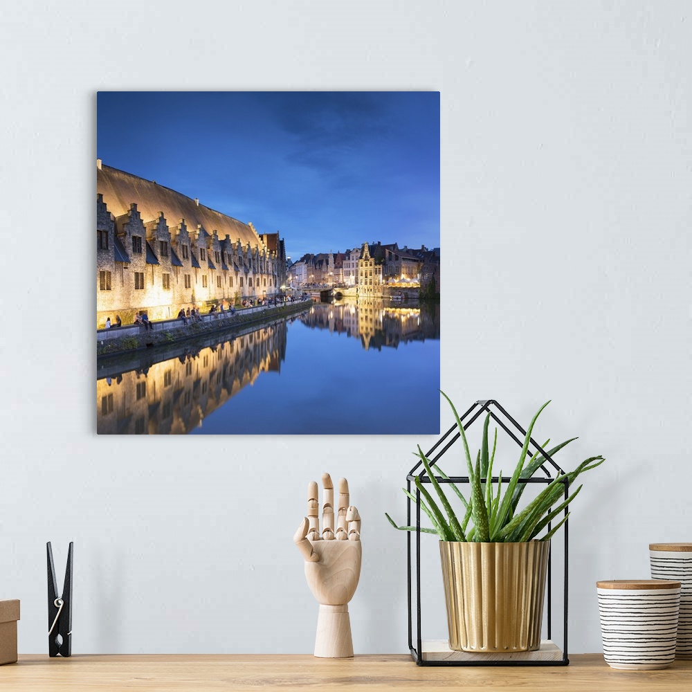 A bohemian room featuring View of Leie Canal at dusk, Ghent, Flanders, Belgium.