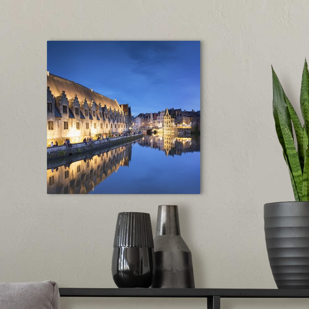 A modern room featuring View of Leie Canal at dusk, Ghent, Flanders, Belgium.