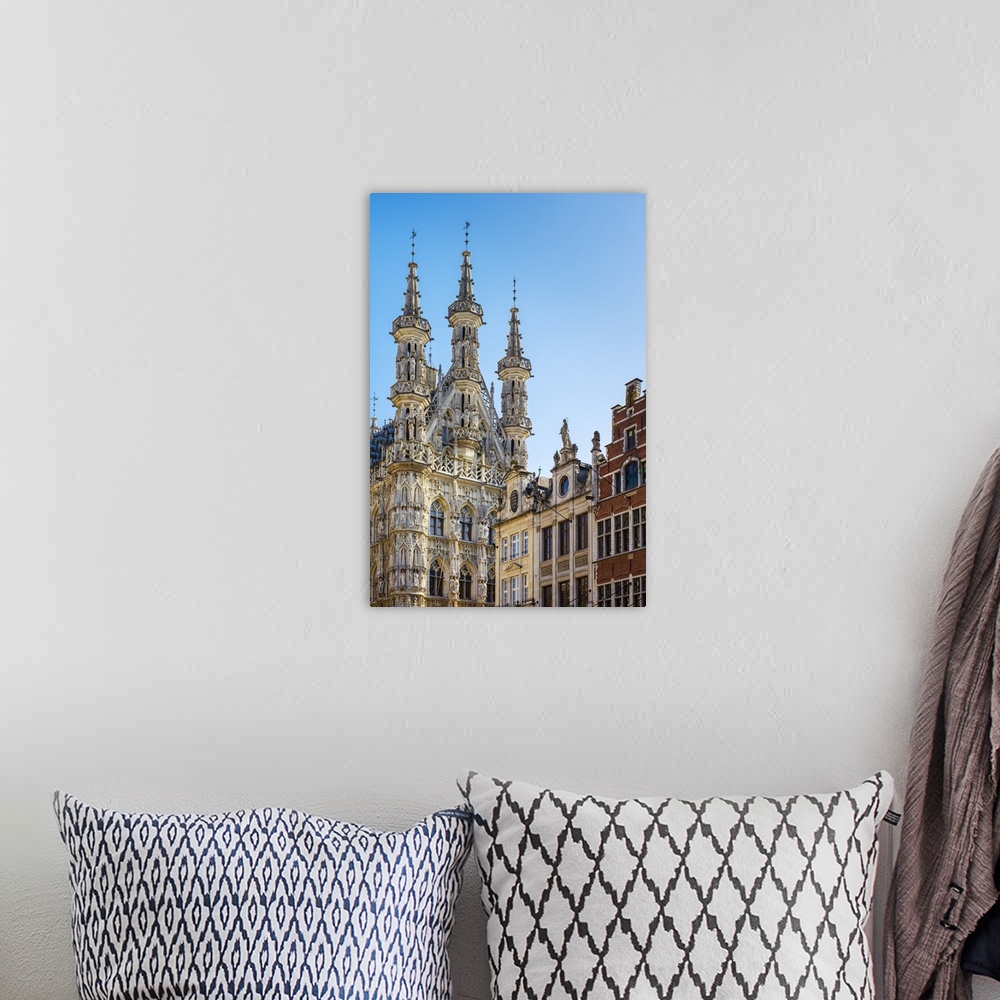 A bohemian room featuring Leuven Stadhuis (City Hall) and Flemish buildings on Grote Markt, Leuven, Flemish Brabant, Flande...