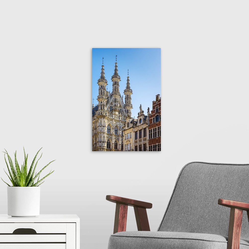 A modern room featuring Leuven Stadhuis (City Hall) and Flemish buildings on Grote Markt, Leuven, Flemish Brabant, Flande...