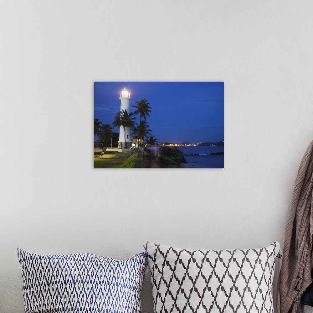 A bohemian room featuring Lighthouse in the Fort at dusk, Galle, Southern Province, Sri Lanka