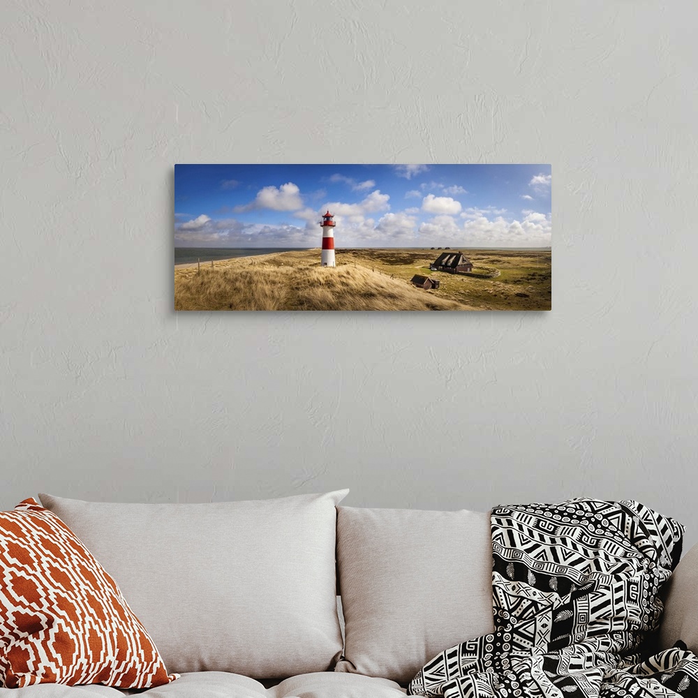 A bohemian room featuring List-Ost lighthouse on the Ellenbogen Peninsula, Sylt, Schleswig-Holstein, Germany.
