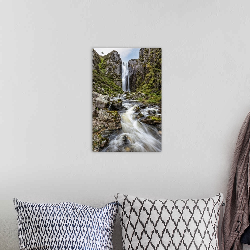 A bohemian room featuring Loch na Gainmhich Waterfall, Sutherland, Highlands, Scotland, United Kingdom.