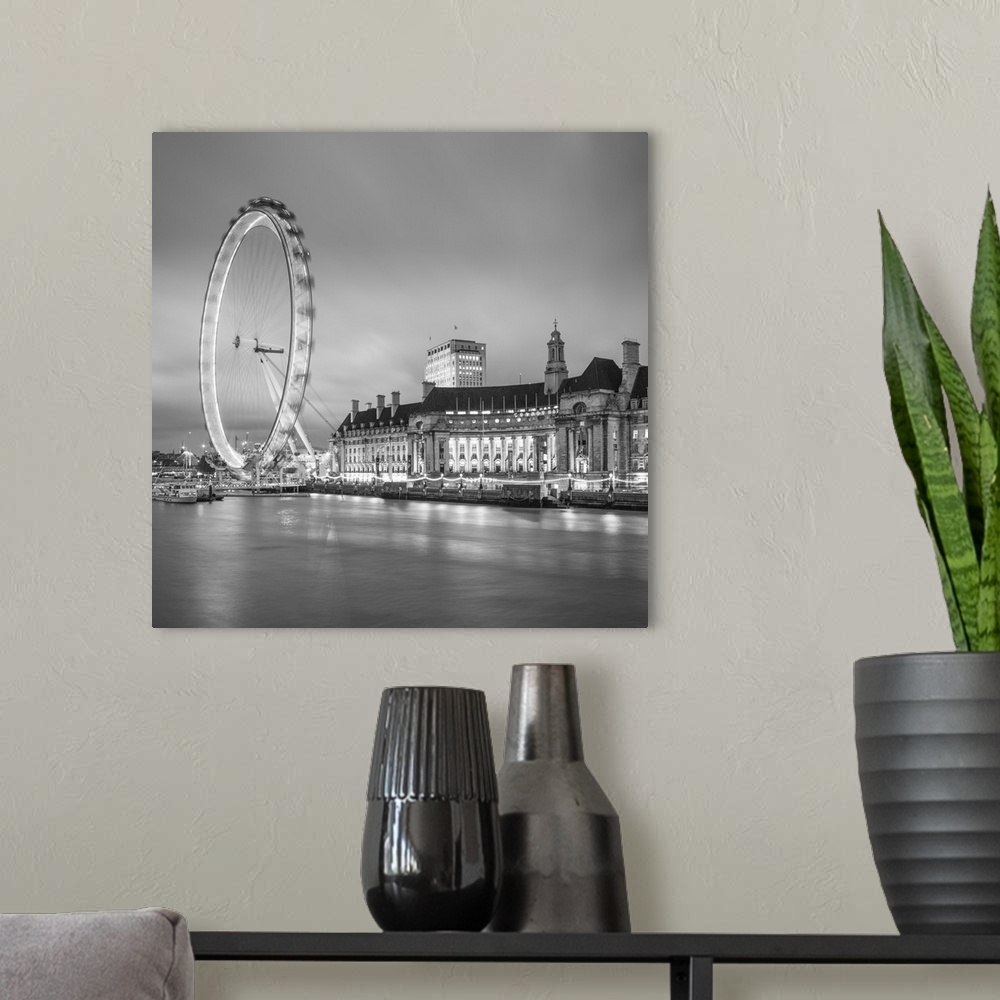 A modern room featuring London Eye (Millennium Wheel) and former County Hall, South Bank, London, England.
