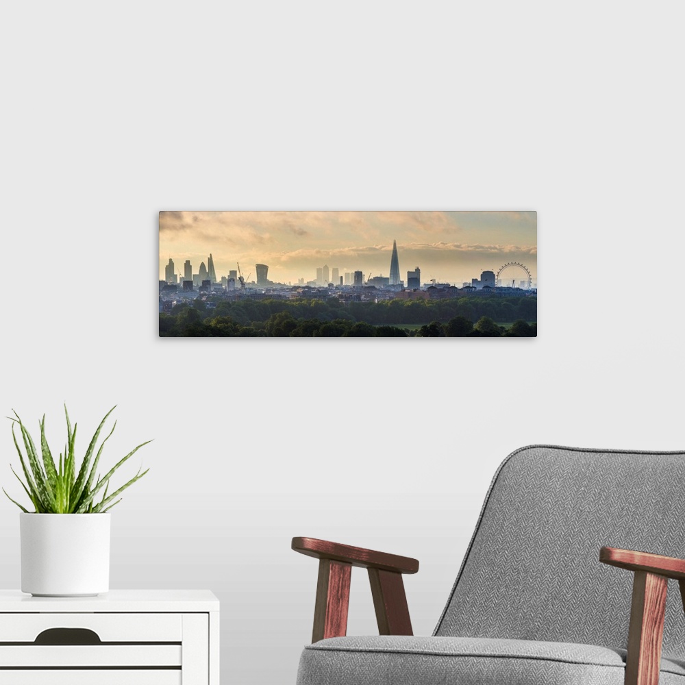 A modern room featuring London skyline with the Shard above Hyde Park, London, England, UK