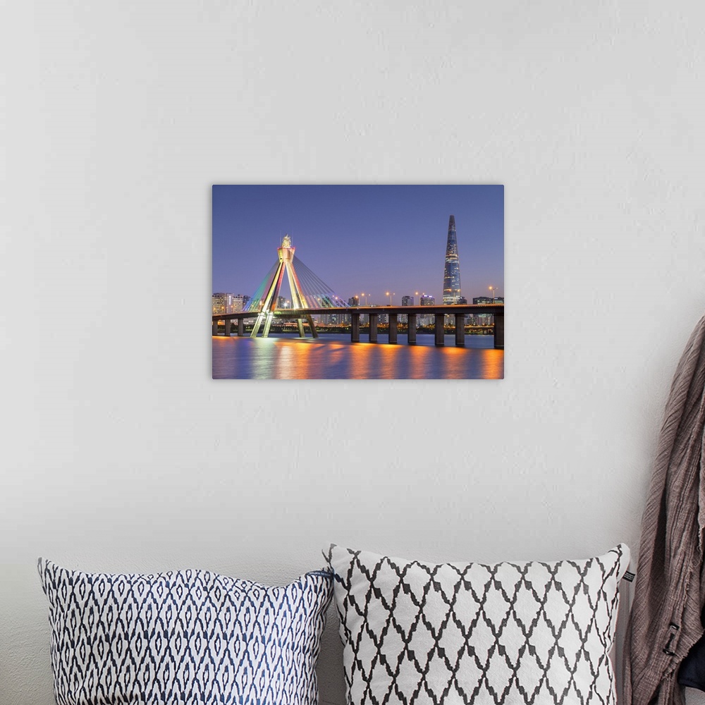 A bohemian room featuring Lotte World Tower and Olympic Bridge at dusk, Seoul, South Korea