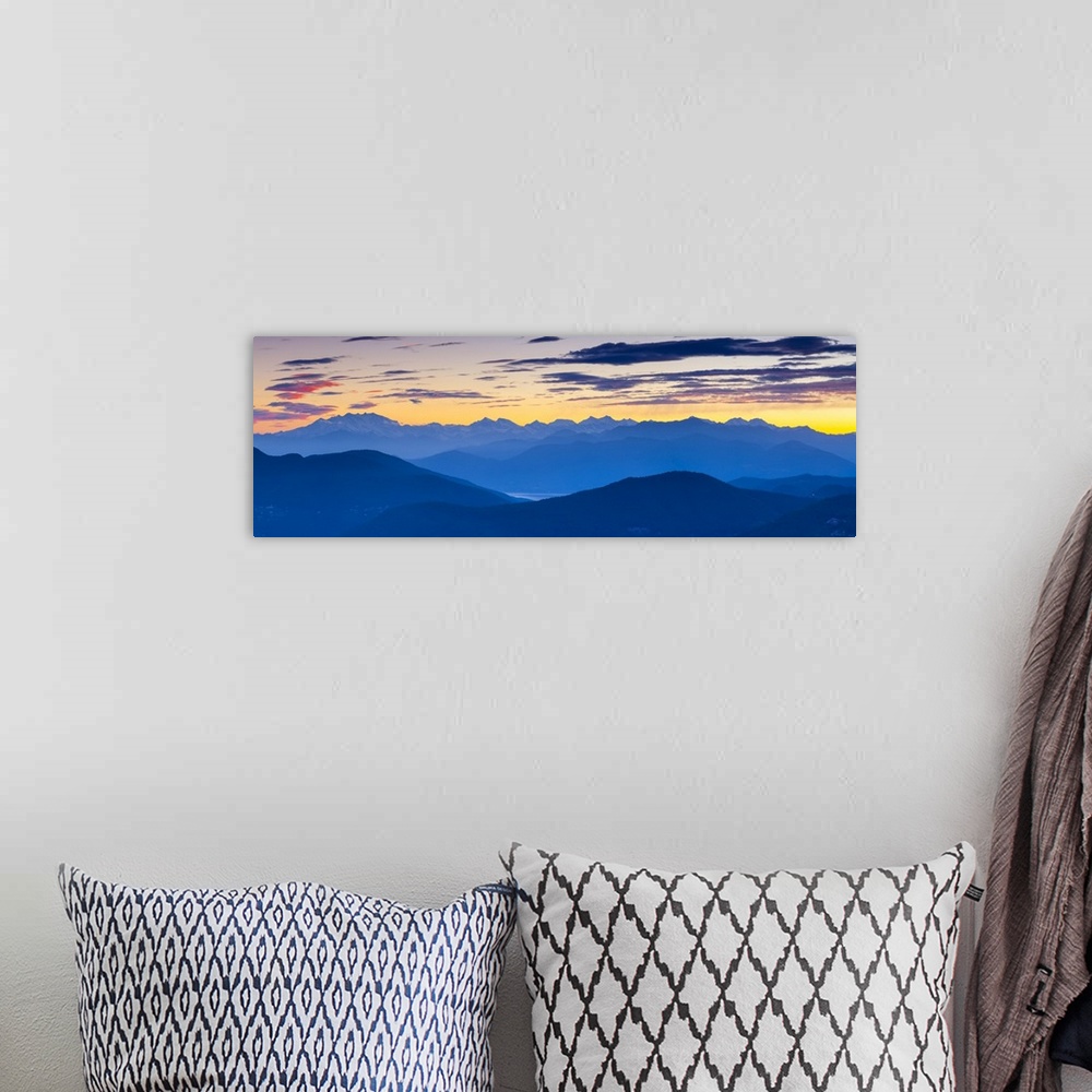 A bohemian room featuring View towards Swiss Alps from Monte San Salvatore illuminated at sunset, Lugano, Lake Lugano, Tici...