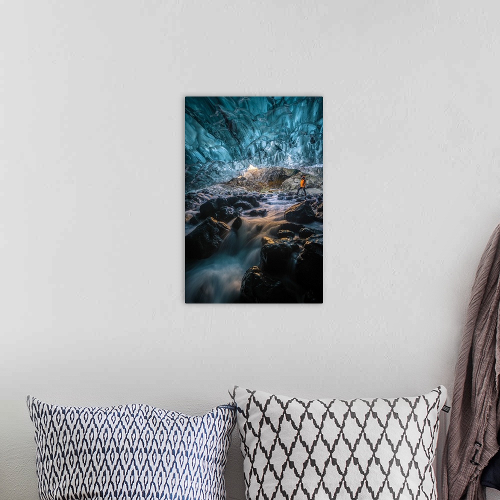 A bohemian room featuring Vatnajokull glacier, Eastern Iceland, Iceland, Northern Europe. Man standing still at the entranc...